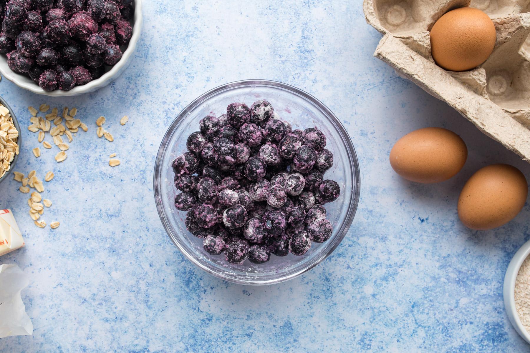 flour coated blueberries