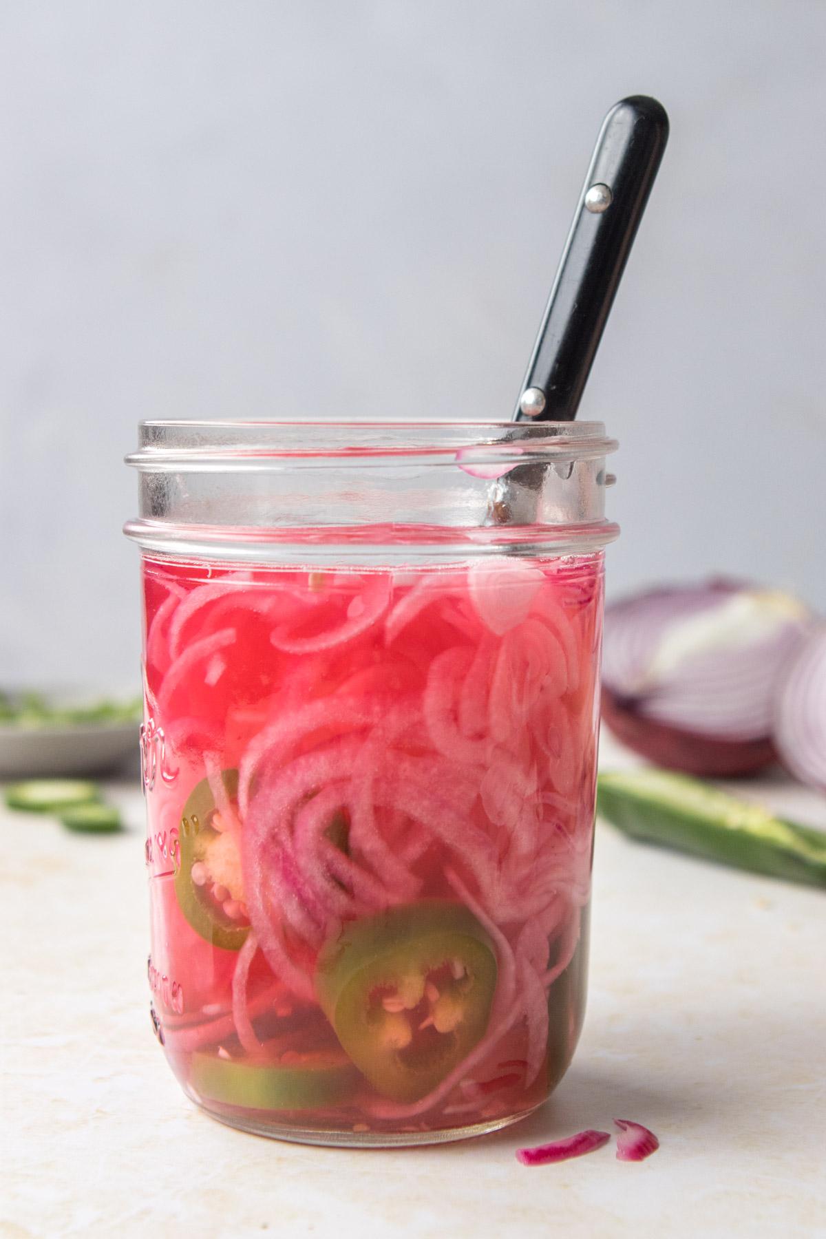 jar of pickled onions and jalapenos