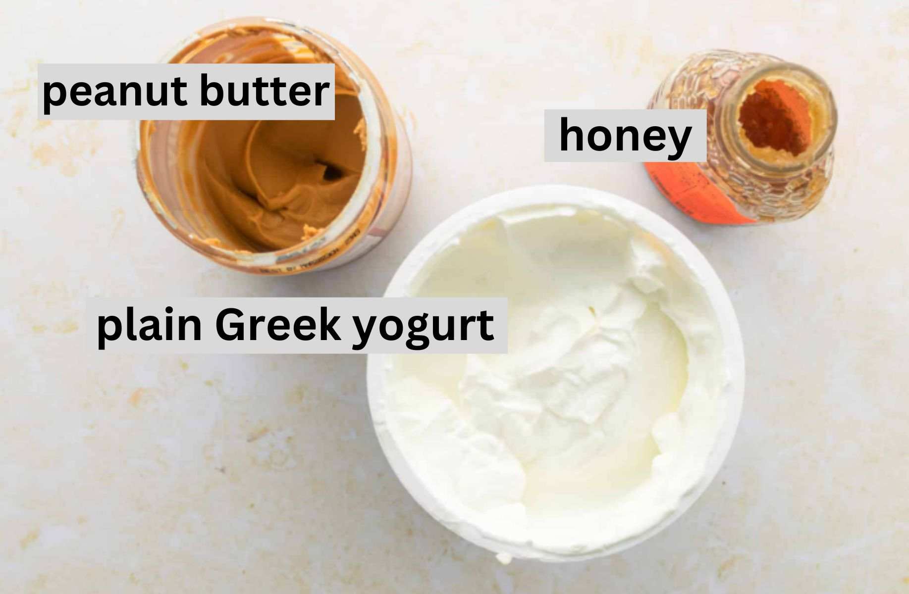 plain yogurt, peanut butter, honey on table