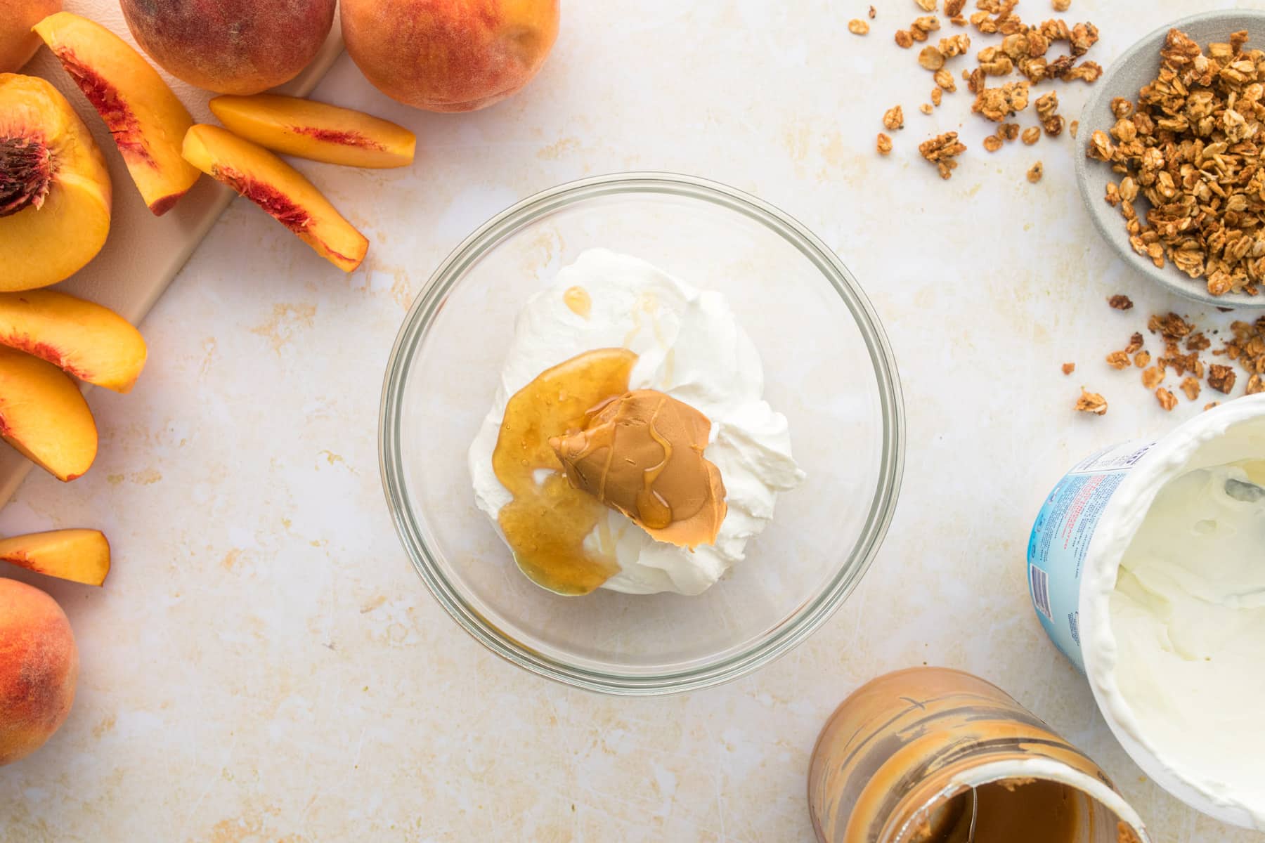 yogurt, peanut butter, honey in bowl