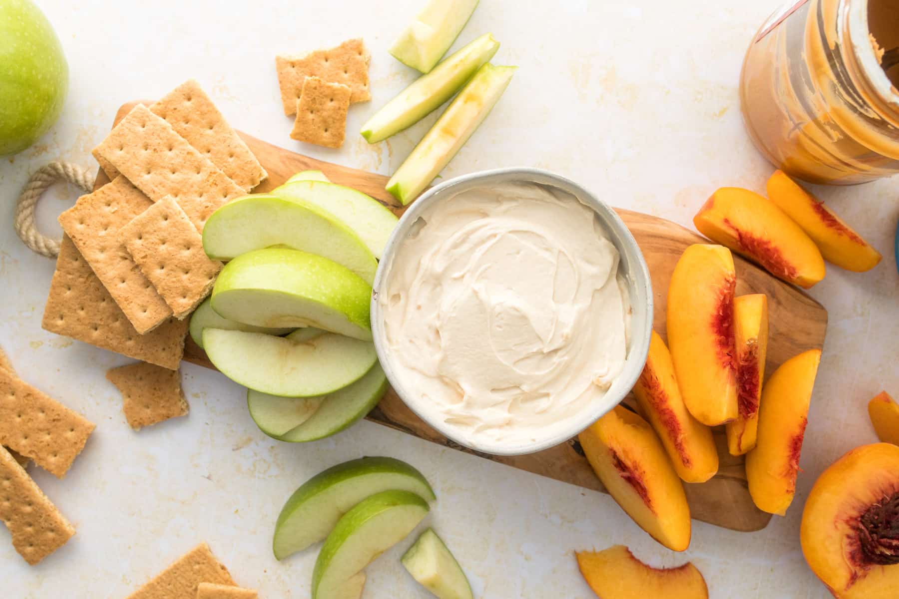 graham crackers, apples, peaches, and yogurt dip