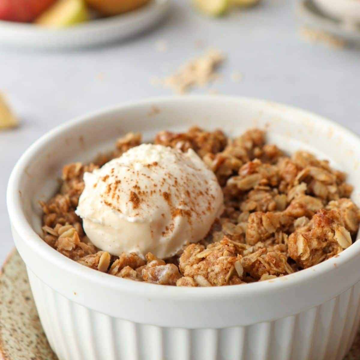 close up of apple crisp with ice cream