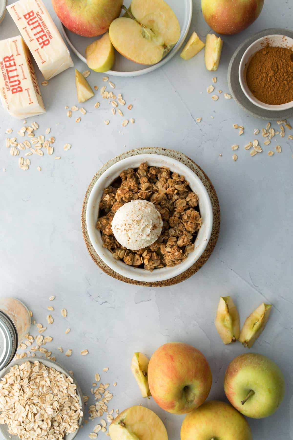 apple crisp with ice cream in bowl