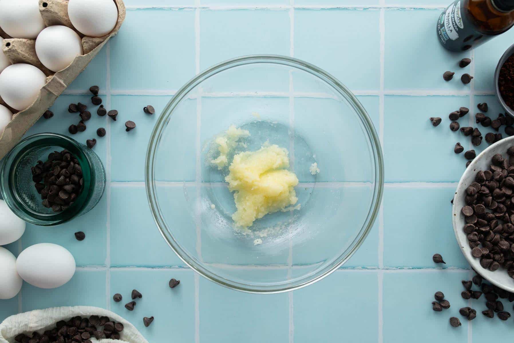 glass bowl of butter and sugar mix