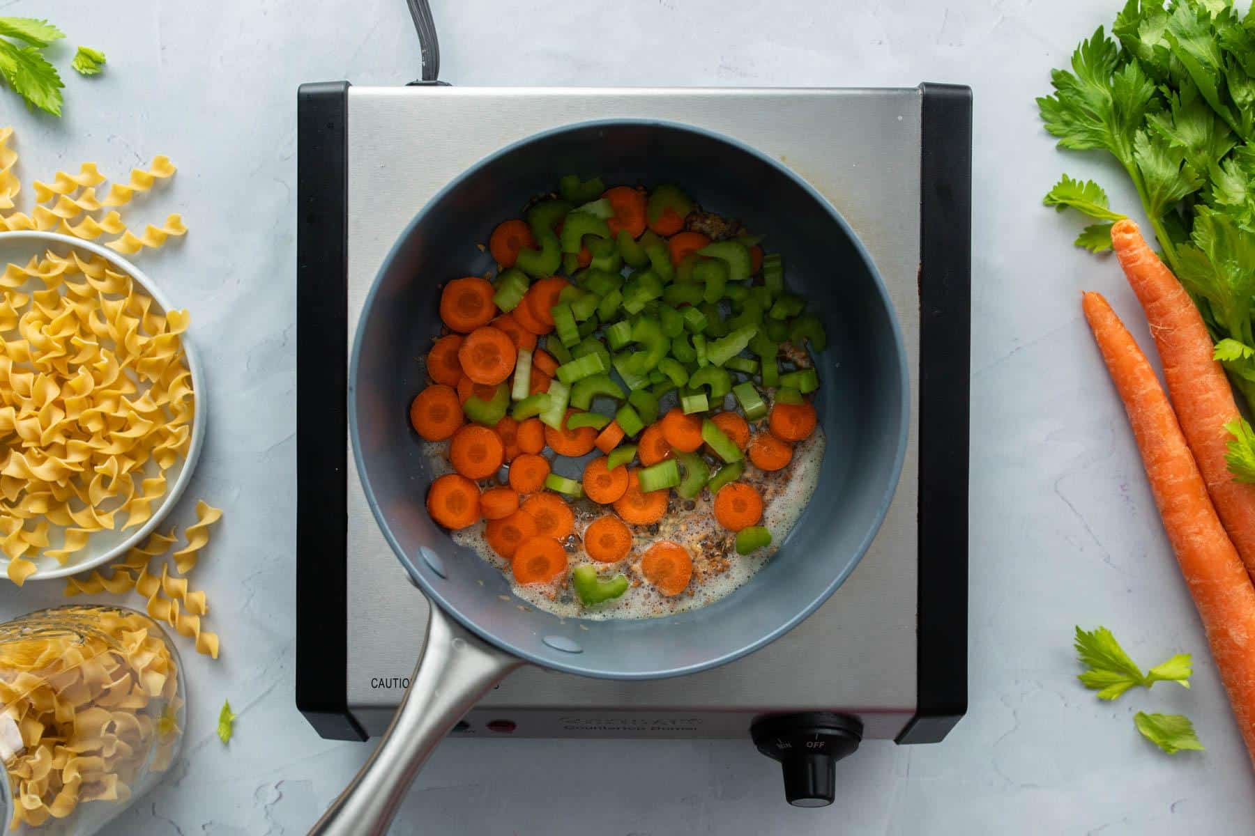 carrots and celery in pot