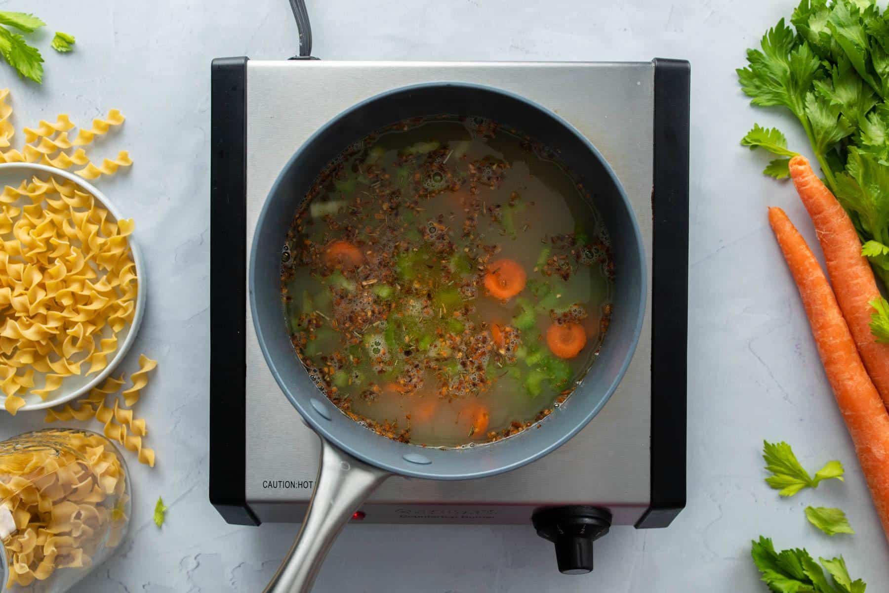 vegetables in broth in pot