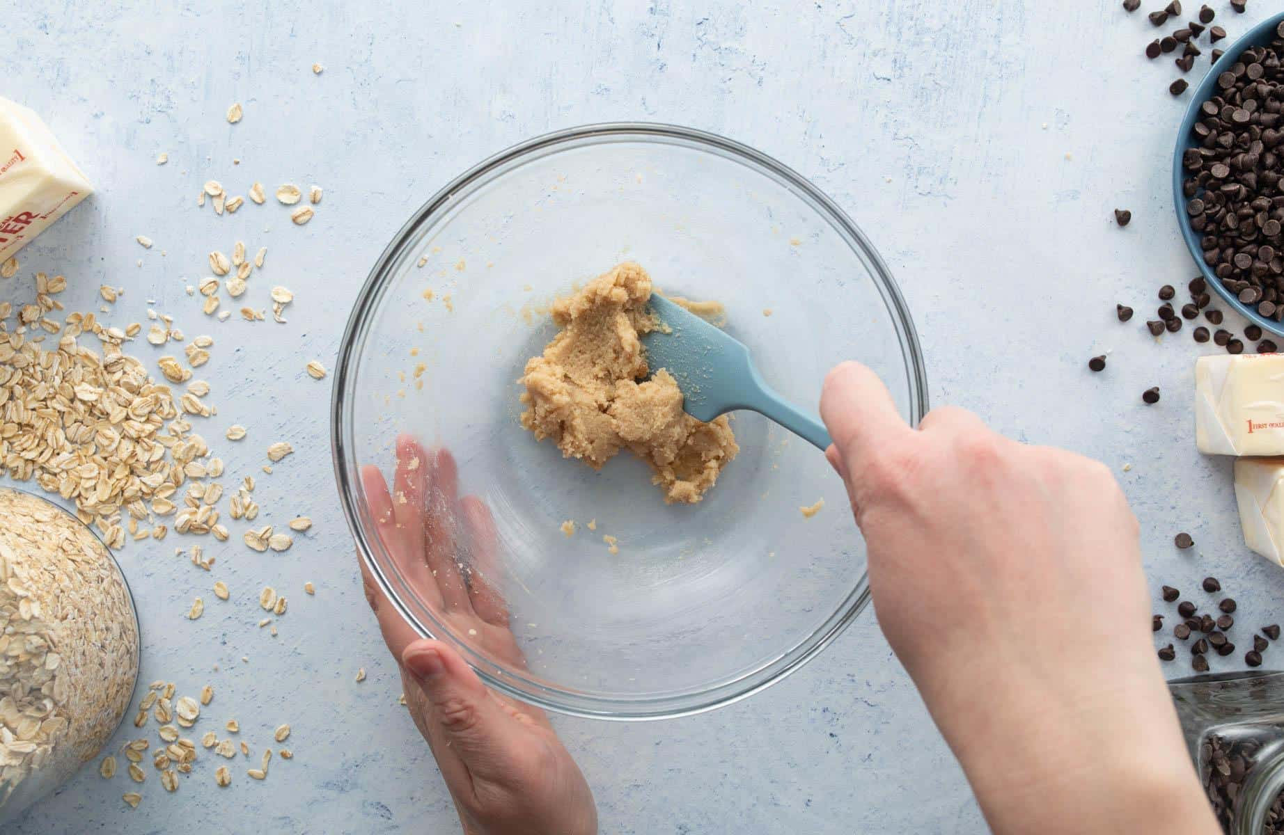 mixing creamed butter and sugar with spatula