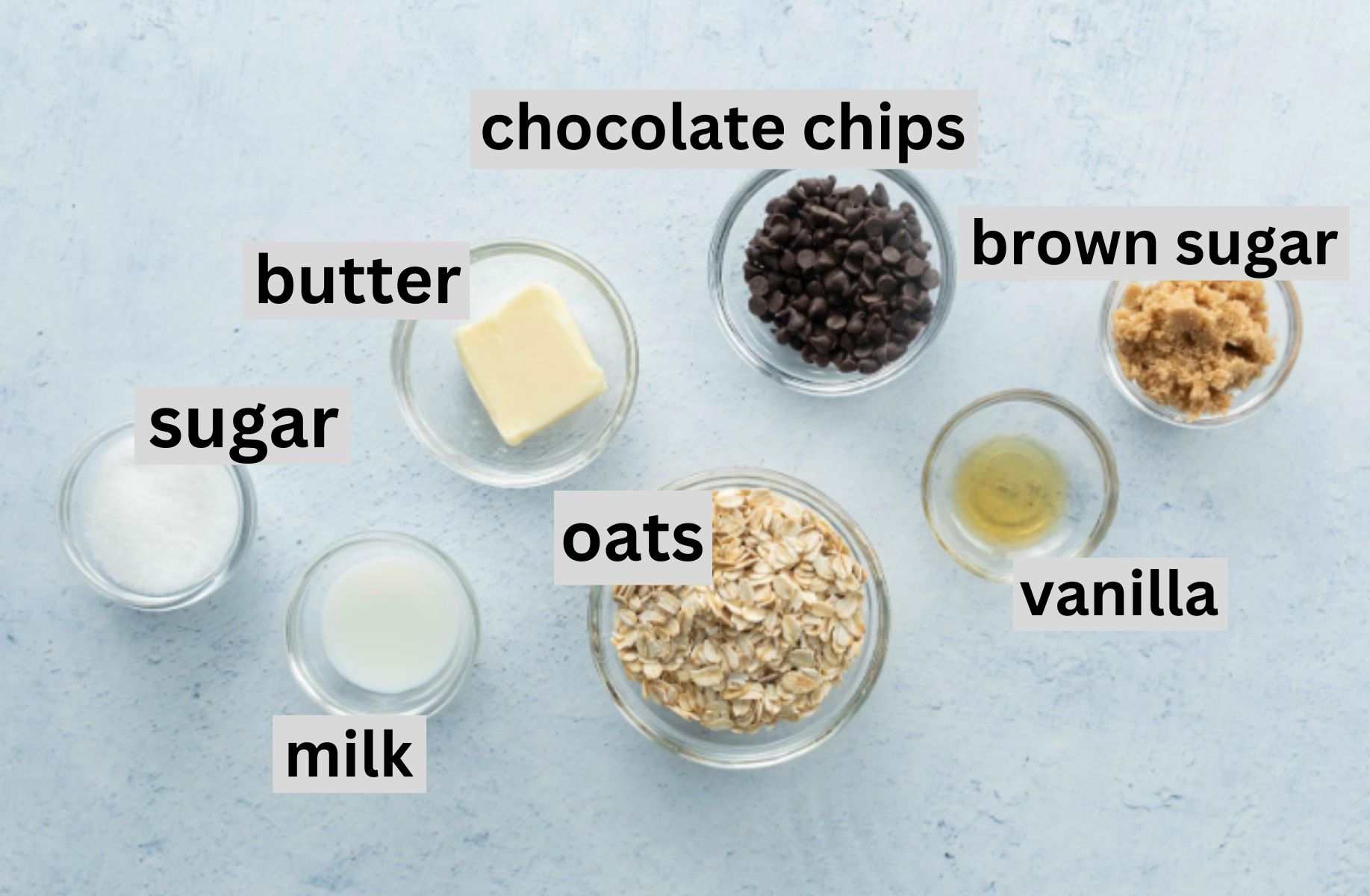 sugars, butter, oats, chocolate chips on table