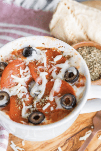 pepperoni, cheese, black olives in mug