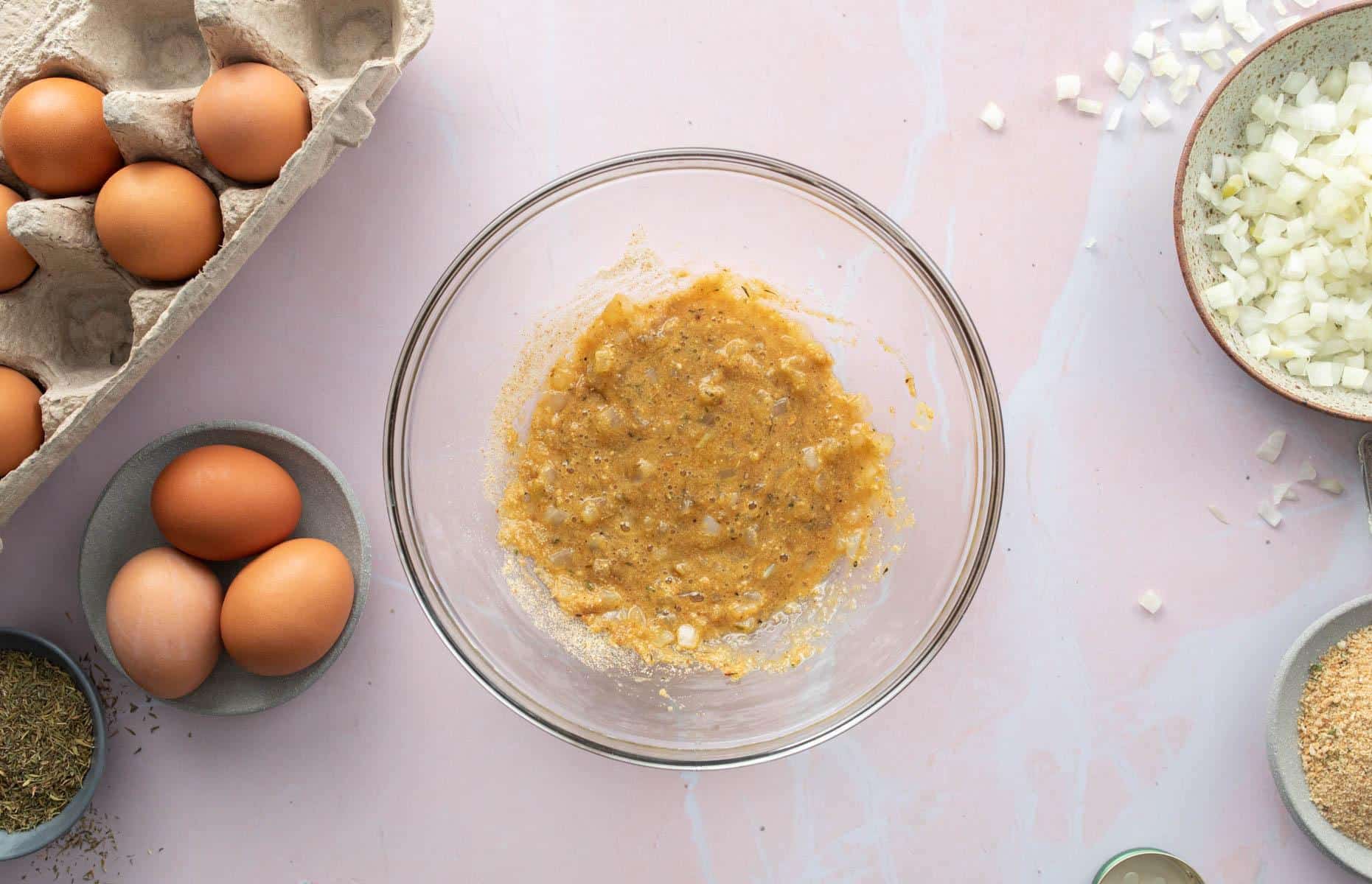 onion, egg, breadcrumb mixture in bowl