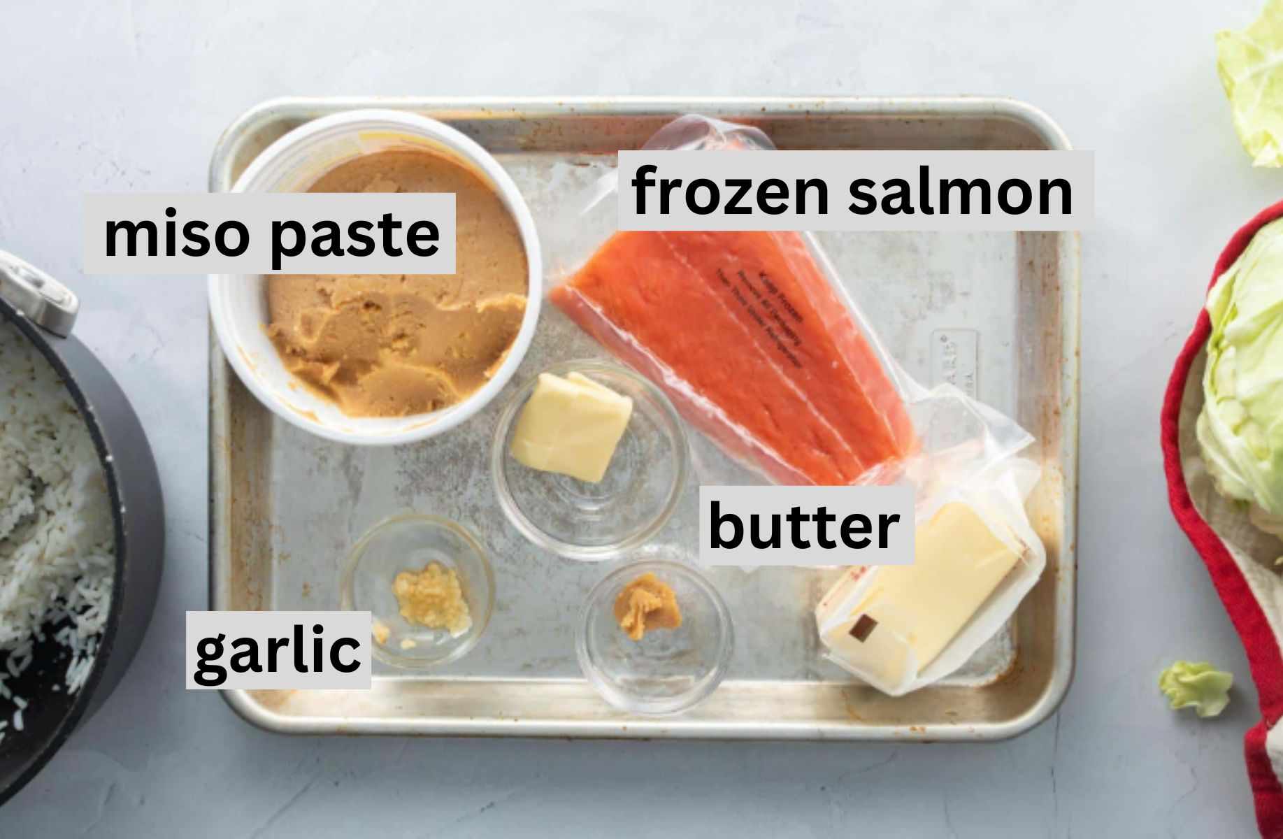 salmon, miso, butter other ingredients on baking sheet