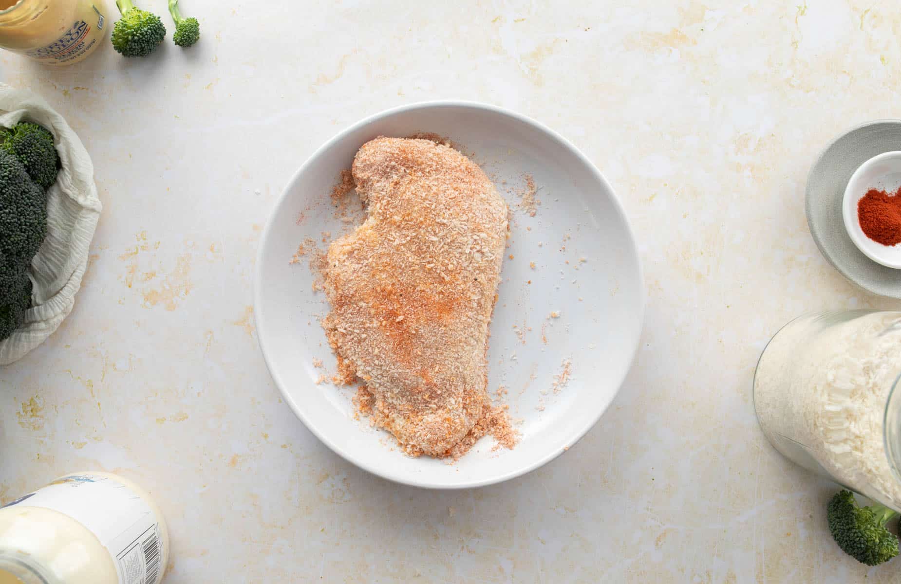 breaded chicken in shallow bowl