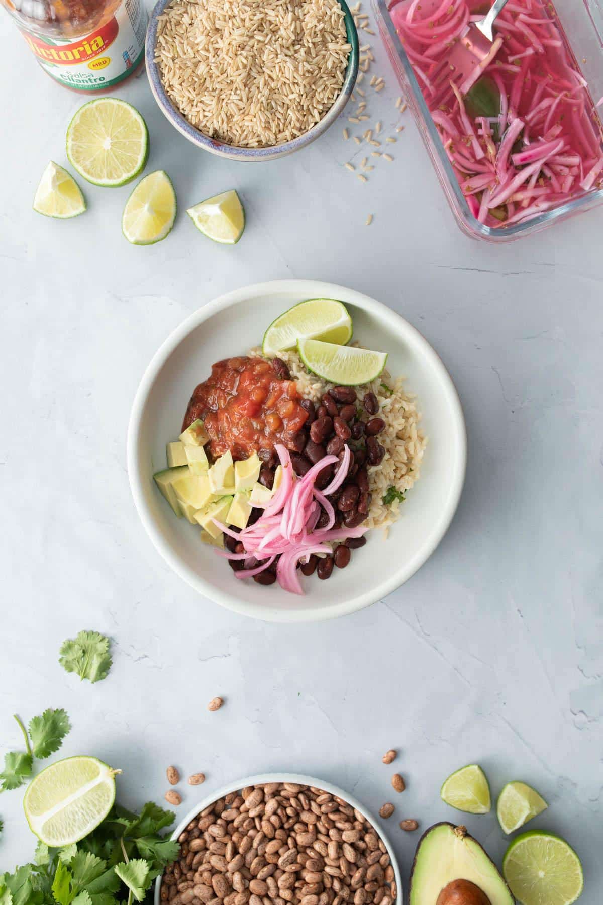 pinto beans and rice bowl with toppings