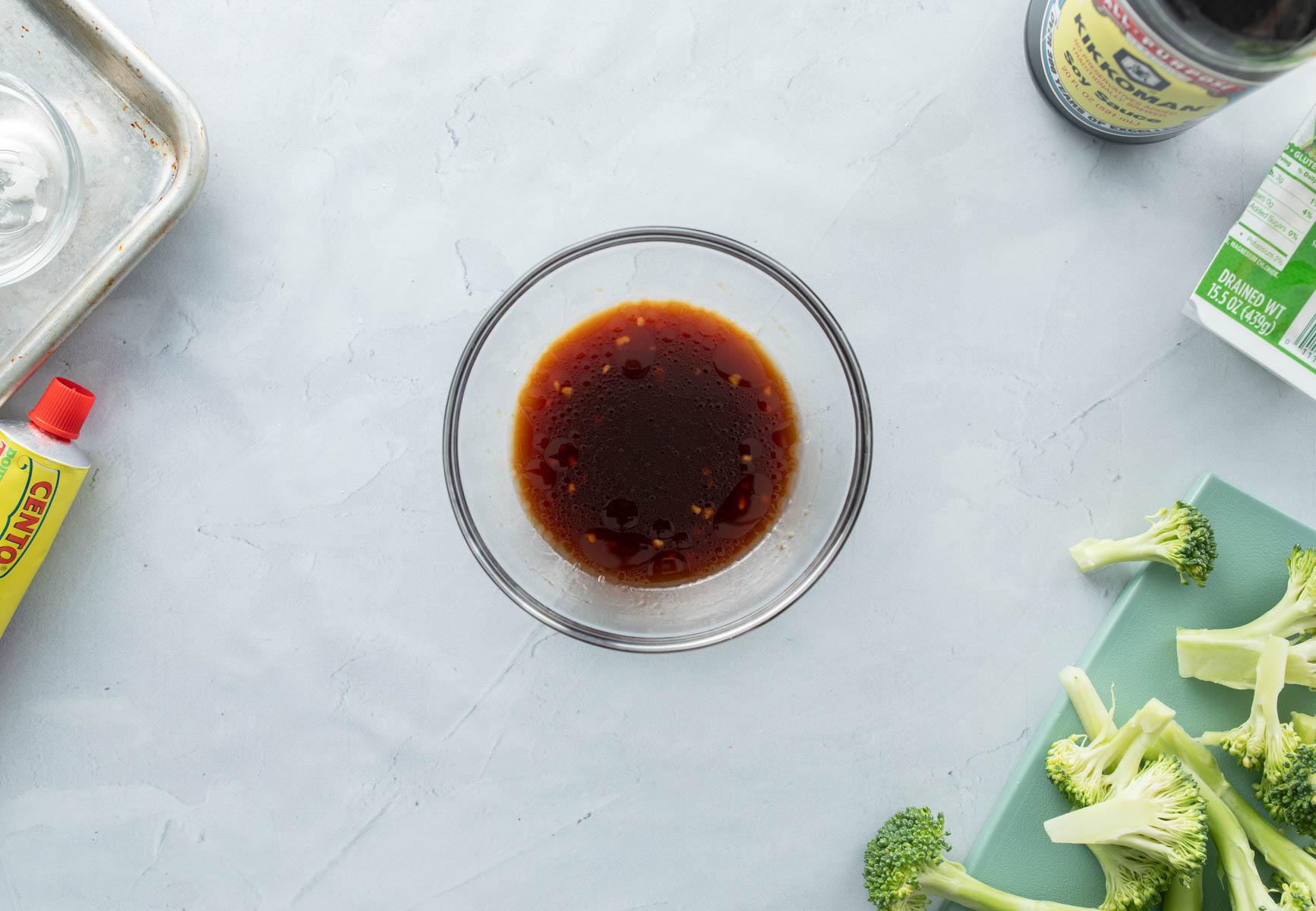 brown sauce in glass bowl