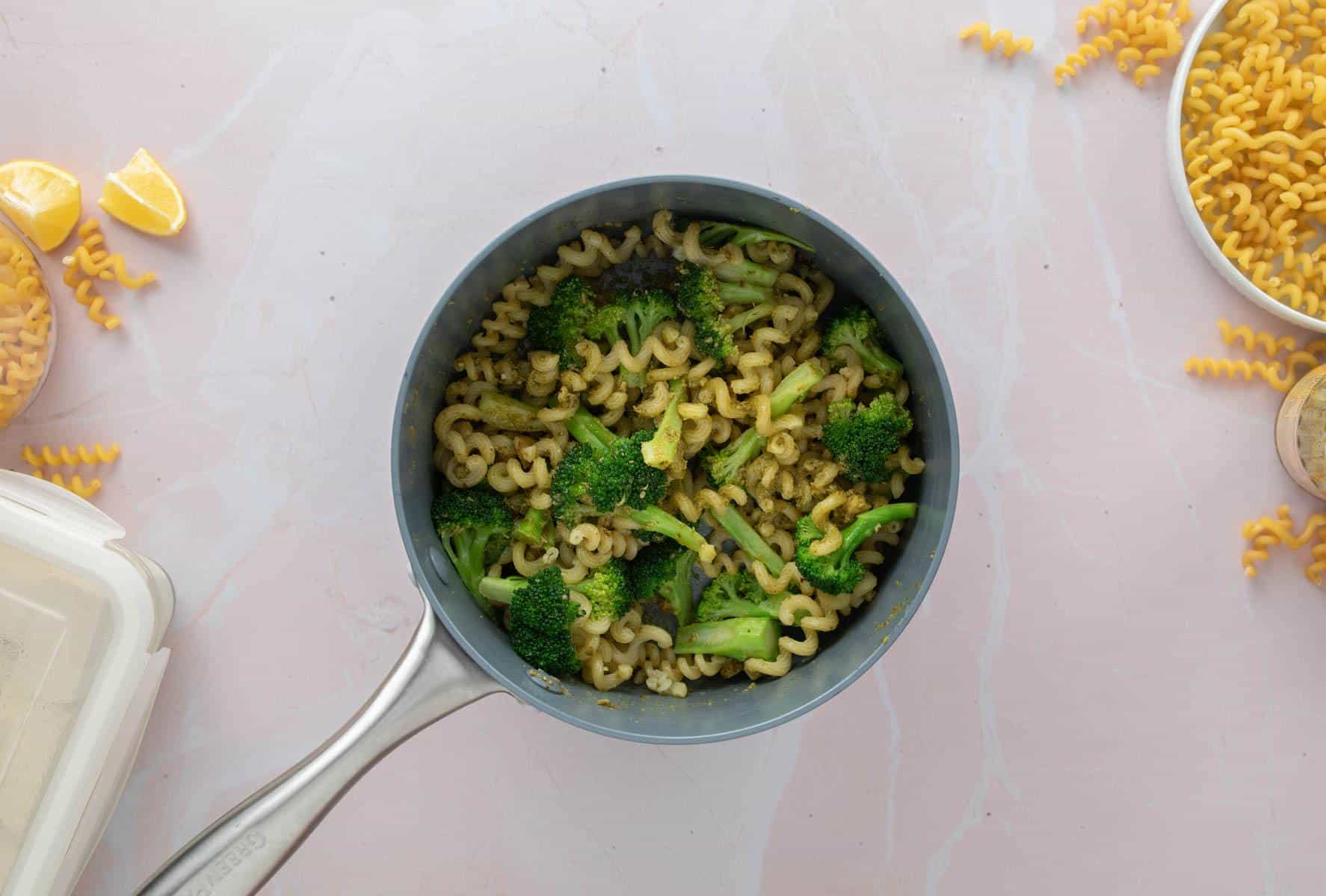 cooked pasta, broccoli in pan