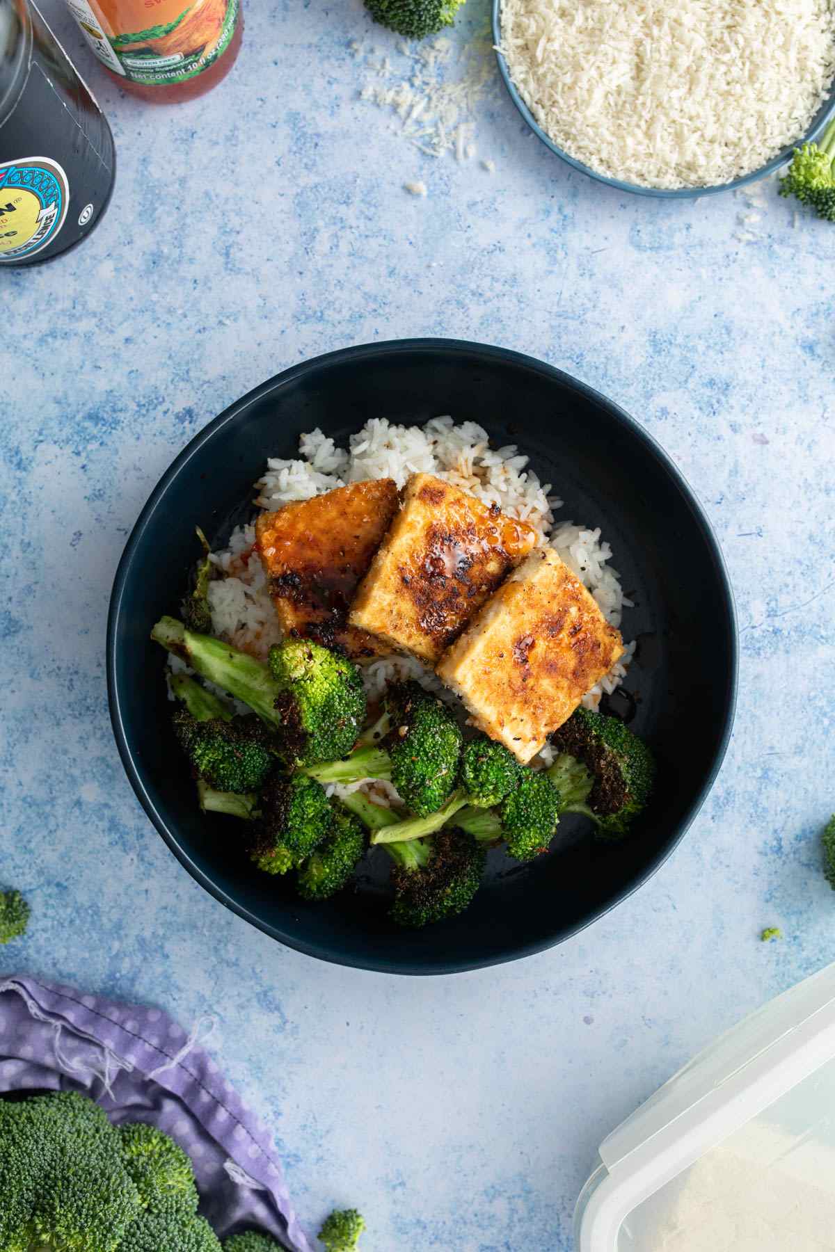 panko tofu with broccoli over rice in bowl