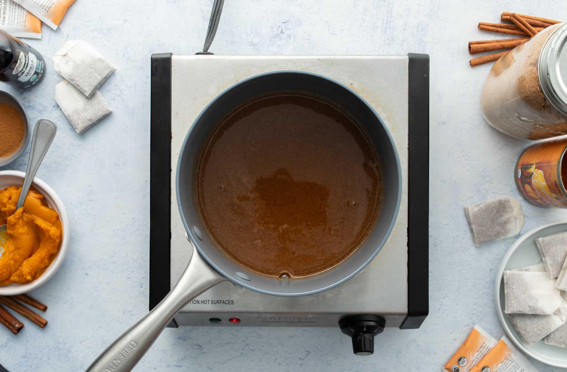 brown drink in saucepan