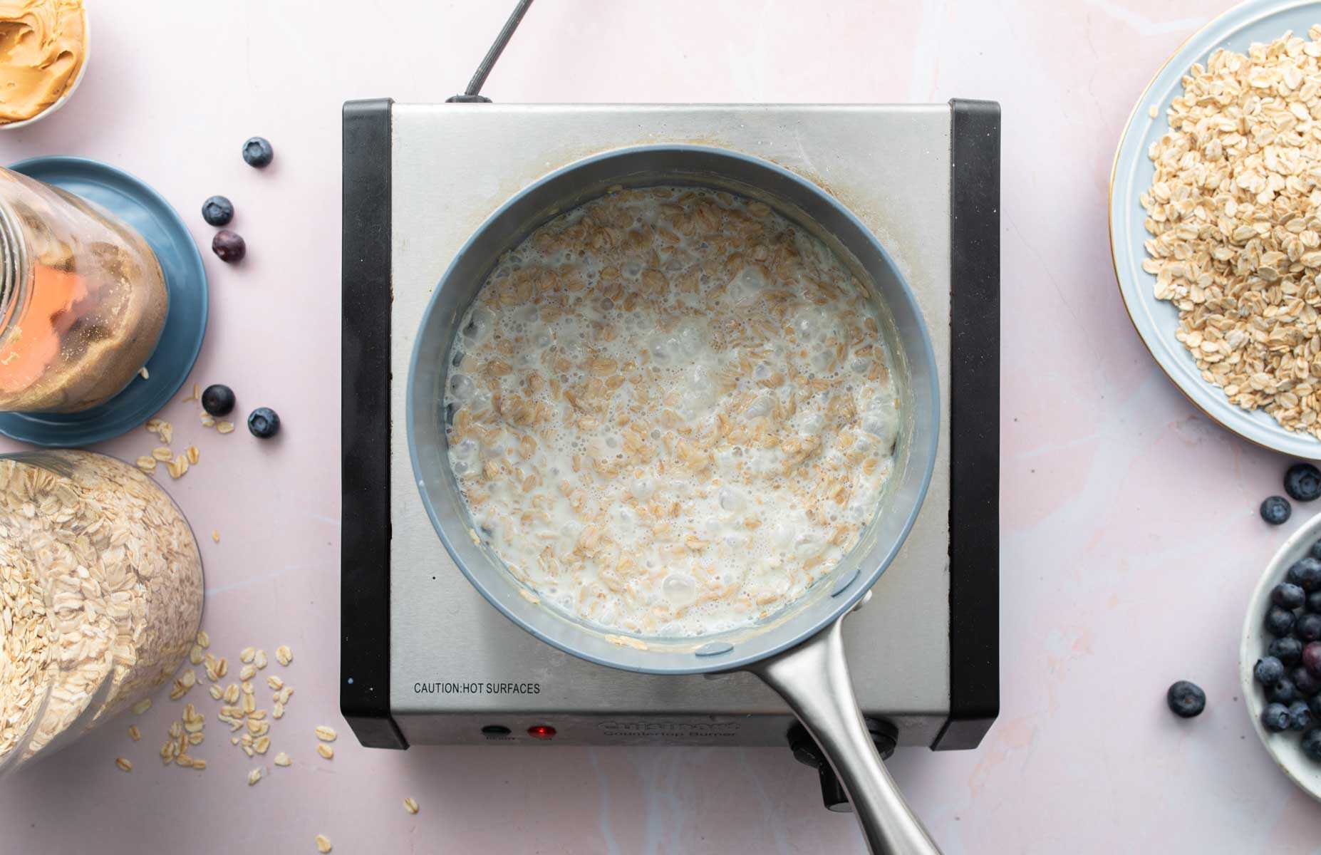 cooked oatmeal in saucepan