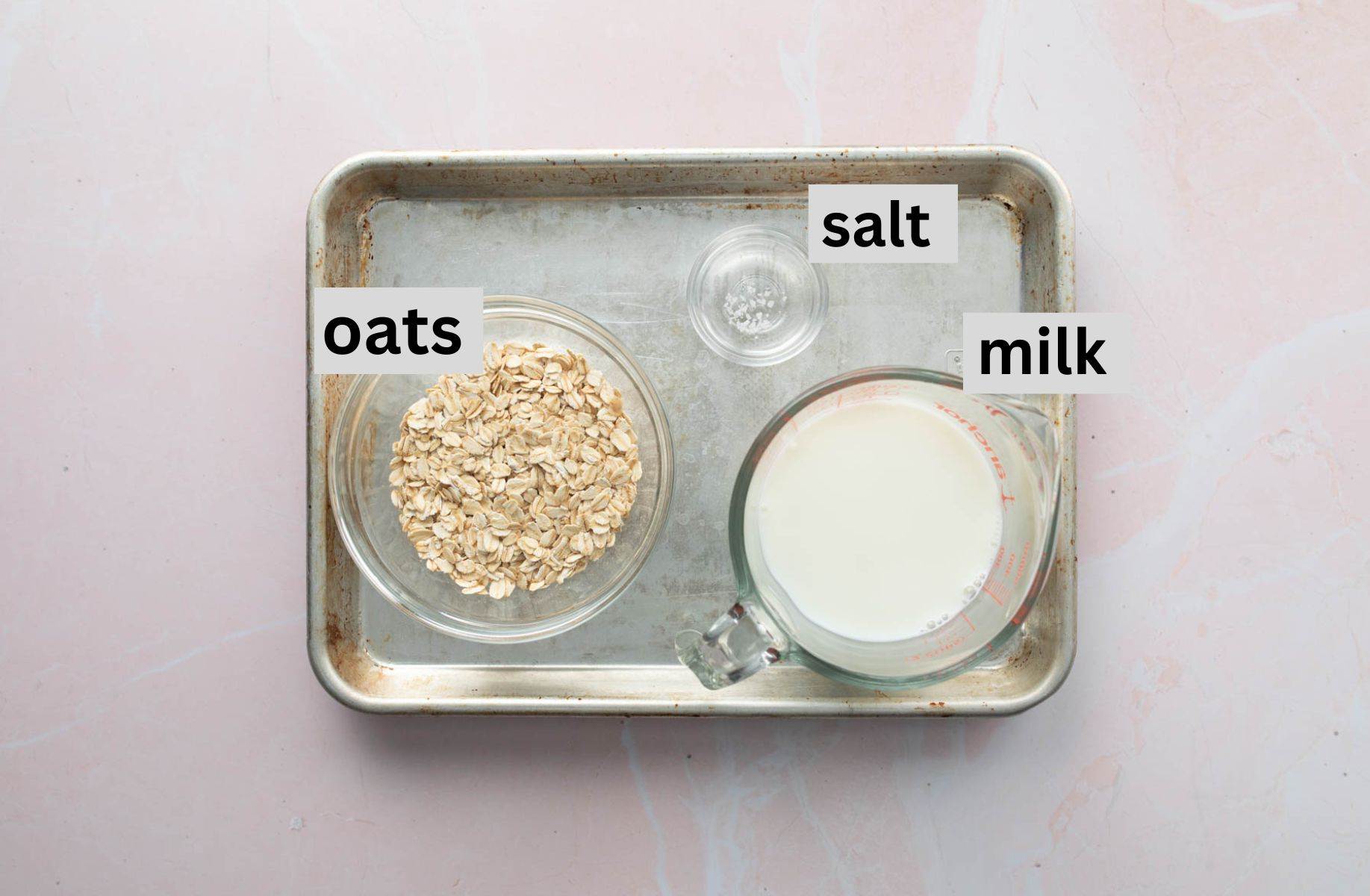 bowls of oats, milk, and salt on sheet pan with labesl