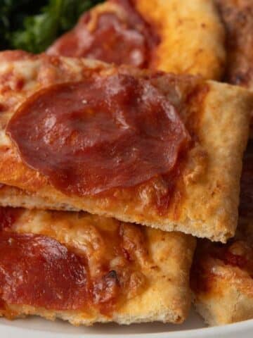 square slices of pepperoni pizza